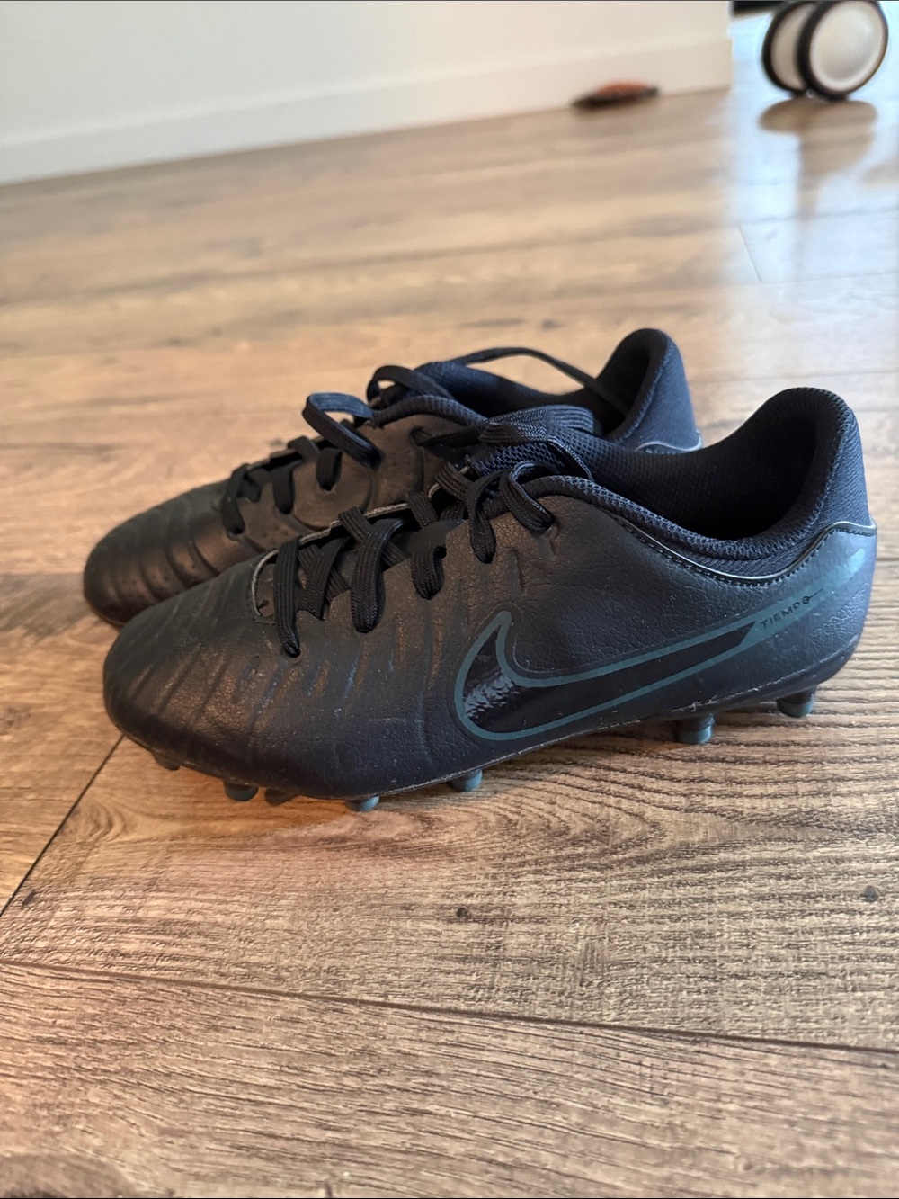 Nike Kids Black Soccer Cleats with Subtle Iridescent Swoosh